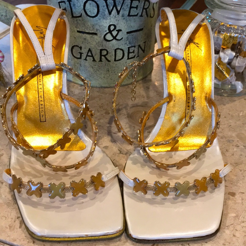 Giuseppe Zanotti, very stylish shoes. The heal is 3 3/4” High.